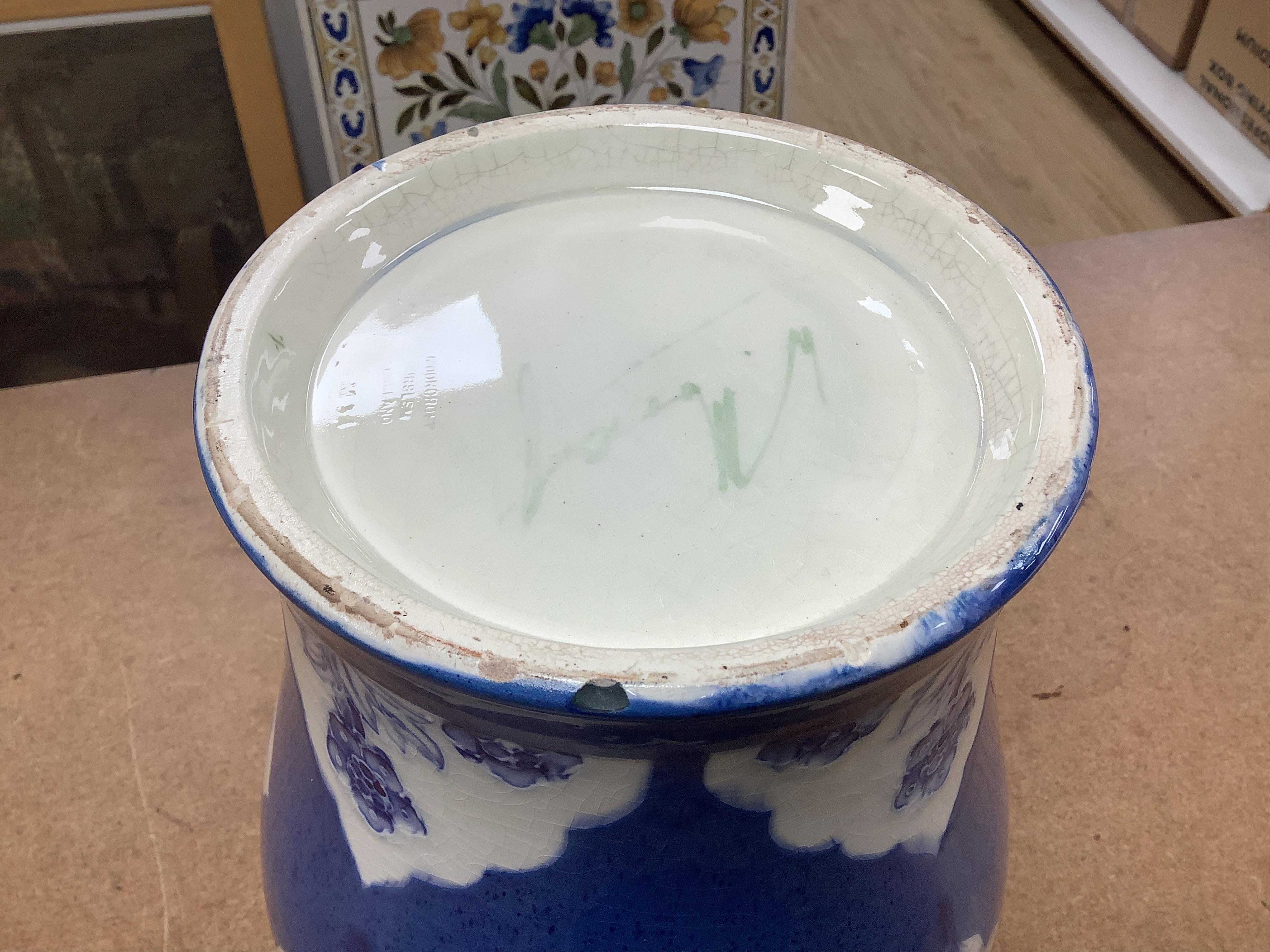 A large Moorcroft late Florian forget-me-nots powder blue temple jar, 29cm high. Condition - fair, chip to base